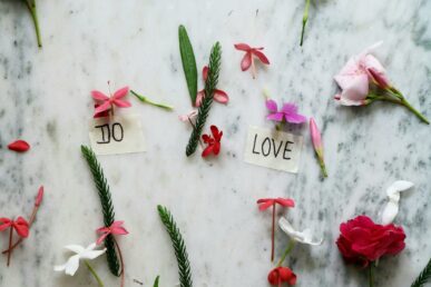 flowers on a pin board with words of hope