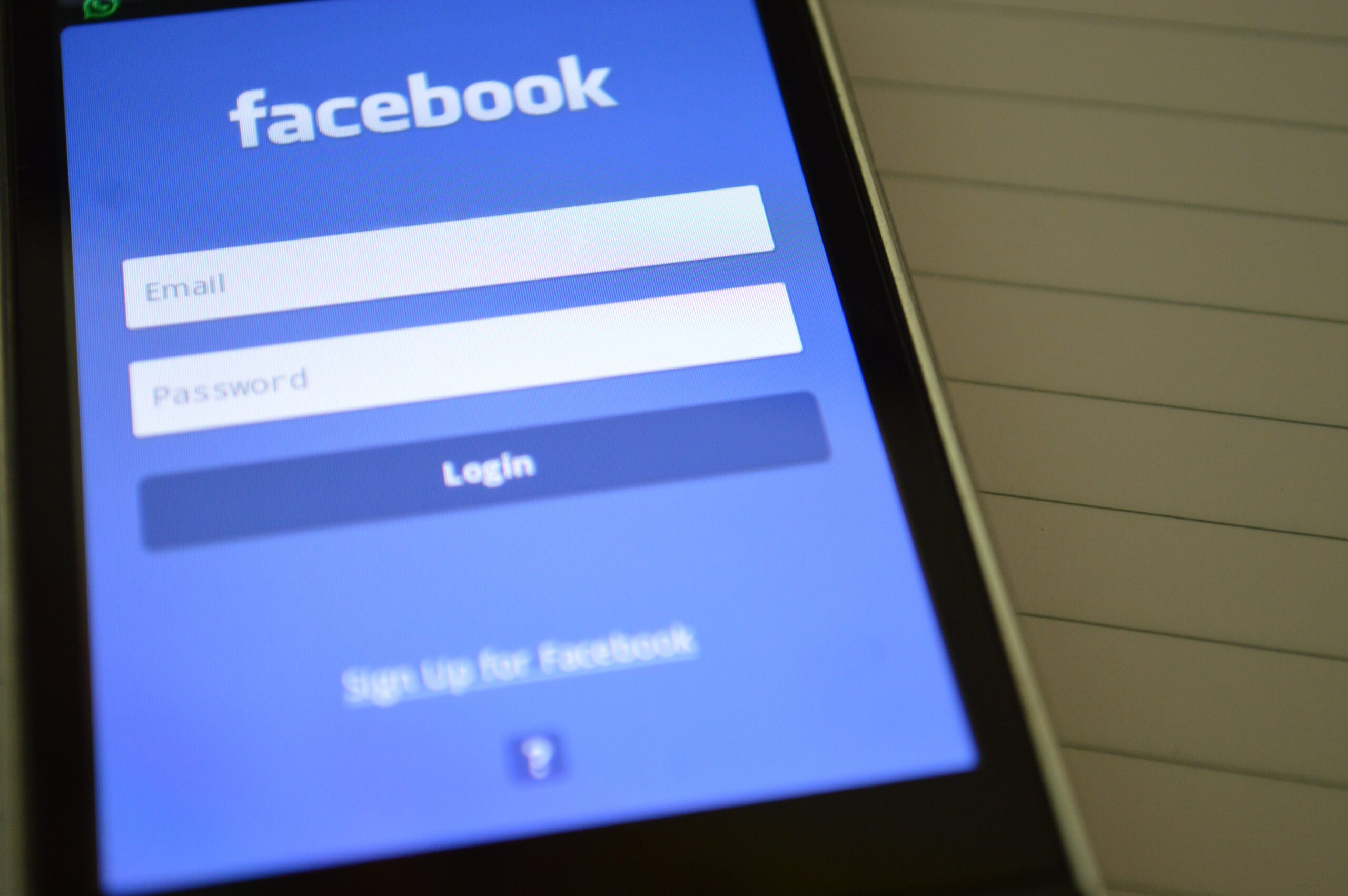 a mobile phone displaying the facebook login page