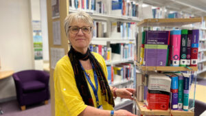Reservist Trish Hobson standing in the library at Yeovil District Hospital.